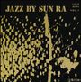 "JAZZ BY SUN RA", oben links. Abstrakte, goldene Flecken auf schwarzem Hintergrund, geometrische Muster.