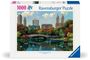Text: "1000 Ravensburger Puzzle". Darstellung: Stadtszene mit Park, Brücke, Booten und herbstlichem Laub.