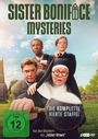„Sister Boniface Mysteries“ - „Die komplette vierte Staffel“. Eine Nonne mit Lupe, umgeben von drei Personen, im Freien.