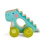 "haba" auf einem türkisfarbenen Dinosaurier-Holzspielzeug mit Rädern, rosa Wangen, Lächeln und Zacken auf dem Rücken.