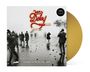 Logo "Jan Delay" in Rot und Gelb. "searching for the jan soul rebels" unten. Menschen laufen durch Rauch, gelbe Vinyl-Schallplatte.