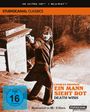 Oben steht "STUDIOCANAL CLASSICS". Unten sieht man einen Mann mit Pistole auf einer Treppe.