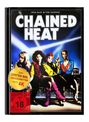 Große Titel "CHAINED HEAT", darunter vier Frauen vor einem nächtlichen Stadthintergrund, gelber Sticker: "ERSTEN MAL 4K".