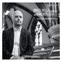 Text: "Orgelmusik im Wandel des Kirchenjahres", "Andreas Marquardt", "Sauer-Orgel | Johanneskirche Saalfeld", "Querstand". Portrait eines Mannes im Anzug vor einer Orgel.