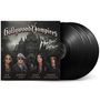 „Hollywood Vampires“ oben, darunter „at Montreux“ in Schreibschrift. Personenbilder vor einem Schloss.
