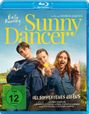 Text: "Sunny Dancer", "Der Sommer deines Lebens", "FSK ab 12 freigegeben". Drei Jugendliche lächeln in einer ländlichen Umgebung.