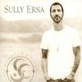 "Sully Erna" und "Hometown Life" steht oben. Ein Mann mit Bart und T-Shirt blickt ernst. Links ist ein rundes Logo.