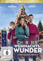 Texte: "OFFICIAL WORLD RECORD ATTEMPT", "CHARLIES WEIHNACHTSWUNDER", "NIKKI DELOACH", "LUCAS BRYANT". Personen vor einem Blockbaum.