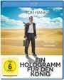 Cover: "Ein Hologramm für den König", "Tom Hanks", "Ein Film von Tom Tykwer nach dem Roman von Dave Eggers", FSK 6. Ein Mann im Anzug steht in einer Wüste.