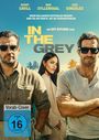 Text: Henry Cavill, Jake Gyllenhaal, Eiza Gonzalez, "IN THE GREY". Drei Personen in sommerlicher Umgebung mit Sonnenbrillen.