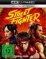 „4K Ultra HD“, „Street Fighter“, „FSK ab 12“, „VORAB-COVER“. Illustration mit drei kämpferischen Personen vor rotem Hintergrund.