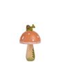 Eine kleine, grüne Schnecke sitzt auf einem orangefarbenen Pilz mit weißen Punkten. Unten sind grüne Grasmuster.