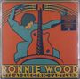 Text: "RONNIE WOOD" und "LIVE AT ELECTRIC LADYLAND". Illustration zeigt eine Person mit Gitarre in kräftigen Farben.