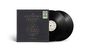 Text: "The Alchemy Index Vols. I & II Fire & Water by Thrice." Zwei schwarze Schallplatten mit Hülle.