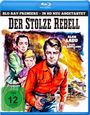 "Blu-ray Premiere - In HD neu abgetastet", "Der stolze Rebell", "Alan Ladd", "Olivia de Havilland". Gemälde von drei Personen.