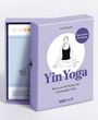 „Yin Yoga“ von Iris Schwarz, Buch mit Karten zum Üben, violette Box, Illustration einer meditierenden Person.
