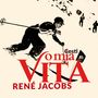 Text: "Cesti o mia VITA RENÉ JACOBS". Schwarz-weißes Bild eines Skifahrers in Aktion, Berglandschaft im Hintergrund.