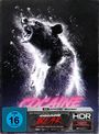 Text: "Cocaine Bear", "Das tierisch blutige Creature-Feature", "FSK ab 16 freigegeben", "4K Ultra HD Blu-ray", "HDR". 

Ein Bär steht mit geöffnetem Maul in einem stürmenden Schneegestöber.