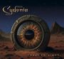 "Cydonia", "Second Sight". Eine riesige Iris wie ein Tor, umgeben von Wüstenlandschaft und Sternenhimmel.