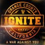 Text: "Orange County Ignite MMXVI California A War Against You." Logo mit brennender Fackel und Blitzen in Gelb und Orange.