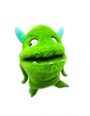 Ein flauschiges, grünes Monster mit blauen Hörnern und großen Augen; es hat einen breiten Mund und kleine Zähne.