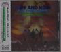 Texte: HERE AND NOW, THE THIRD WAVE, ARRANGED AND CONDUCTED BY GEORGE DUKE. Dunkle Silhouetten vor leuchtendem Hintergrund.