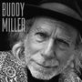 Text: "Buddy Miller". Schwarz-Weiß-Porträt eines älteren Mannes mit Hut und gemustertem Jackett.