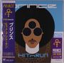 „PRINCE“, „HITnRUN phase one“ mit stilisiertem Gesicht in braunem Afro, drei Brillen, lila Banner mit japanischem Text.