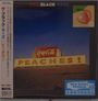"The Black Keys", "PEACHES!", japanische Zeichen links, "New Music Fridays". Ein Foto mit einem Peaches-Schild.