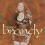 "The Best of Brandy" in großer Schrift, mit einer Frau in stilvoller Pose vor einem abstrakten, warmen Hintergrund.