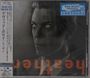 "DAVID BOWIE", "NEW MUSIC FRIDAYS". Schwarz-weißes Porträt mit weißen Augen, orangener Schrift unten. Japanischer Text links.