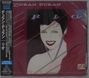 "DURAN DURAN", "RIO", "FOREVER YOUNG". Illustration eines lachenden Gesichts mit markantem Make-up.