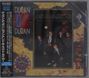 "DURAN DURAN", "SEVEN AND THE RAGGED TIGER", vertikaler japanischer Text. Albumcover mit fünf Personen in Anzügen.