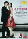 "La Traviata: Verdi. Anna Netrebko, Rolando Villazón, Thomas Hampson. Wiener Philharmoniker. Mann und Frau in eleganter Kleidung."