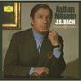 Text: Nathan Milstein, J.S. Bach, Sonaten & Partiten.  
Ein eleganter Mann sitzt und blickt ernst in die Kamera.