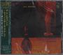 "Gil Evans" in Gelb; "New Bottle Old Wine" in Rot; jazziges Cover mit Skulptur im Hintergrund und Flasche im Vordergrund.