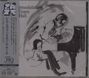 Titel: Intermodulation. Künstler: Evans, Hall. Illustration von Musikern am Klavier und einer Gitarre. Japanischer Text links.
