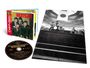 "Best! Beatles Vol. 1" Albumcover mit Foto der Band, CD mit Titeln und Schwarz-Weiß-Fotografie eines Konzerts.