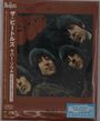 Japanischer Text, "The Beatles" oben links, vier Männer blicken in die Kamera vor einem dunklen Hintergrund, "NEW MUSIC FRIDAYS" unten rechts.