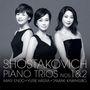 "SHOSTAKOVICH PIANO TRIOS NOS.1&2. MARI ENDO - YURIE MIURA - TAMAKI KAWAKUBO." Drei Frauen in dunkler Kleidung posieren.
