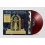 Aufschrift: „The Mission: God's Own Medicine“. Goldene Illustration von Frau im Bogen, flankiert von Löwen, dunkelrotes Vinyl.