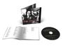 CD-Cover mit Text "THE SMITHS BEST... I", daneben ein CD-Booklet mit Songtexten und eine schwarze CD mit weißem Text.