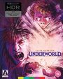 Auf einer Illustration Schriftzug "Clive Barker's Underworld". Zwei Gesichter, eins schreiend, ein weiteres mit leeren Augen.