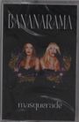 Text: „BANANARAMA“ oben, „masquerade“ unten. Zwei Frauen mit floralen Dekorationen auf schwarzem Hintergrund.