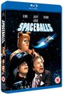 „SPACEBALLS“ in großen, leuchtenden Buchstaben. Darunter drei Personen: eine mit Helm, eine mit Hundekostüm, eine erschrocken.