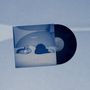Text: "STOREFRONT CHURCH" und "Blue Movie". Cover zeigt Person liegend. Daneben eine schwarze Vinyl-Schallplatte.