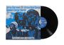 Text: „Adrian Sherwood, African Head Charge, Speakers Corner Quartet, Barbican Heights.“  
Illustration: Musiker in Blau.