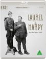 "Laurel & Hardy: The Silent Years - 1927." Zwei Männer in Uniformen, einer steht erhöht. Lachender Ausdruck. Vintage-Stil.
