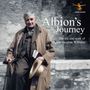 "Albion's Journey: The life and work of Ralph Vaughan Williams." Ein älterer Mann steht in einem Mantel mit einem Buch in der Hand.