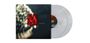 Text in der Mitte: "MOVEMENTS AND INTERIORS". Links unscharfe Lichter, roter Bereich. Zwei transparente Schallplatten sichtbar.